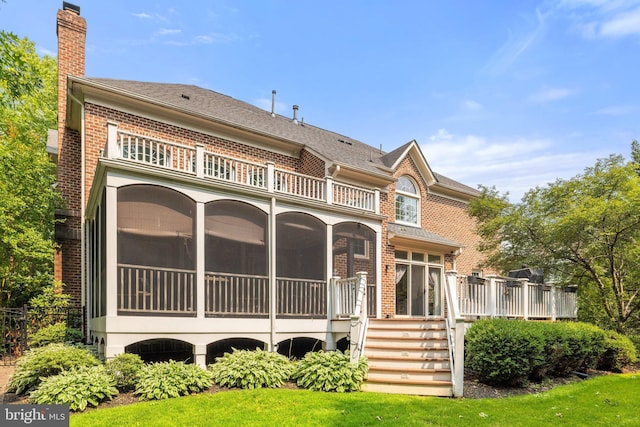 18309 Eldorado Way, Leesburg, VA 20176 - rear view of property with a balcony, a sunroom, a chimney, brick siding, and roof with shingles