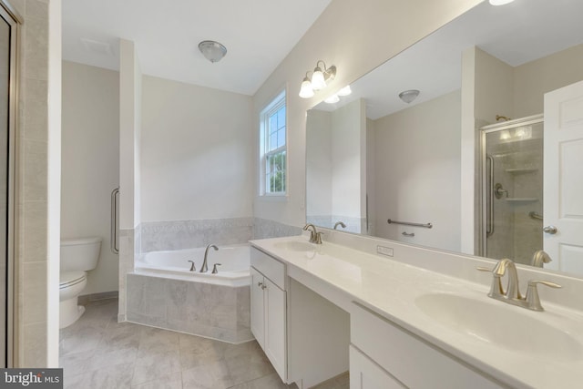 bathroom with a shower stall, a bath, toilet, double vanity, and marble finish flooring