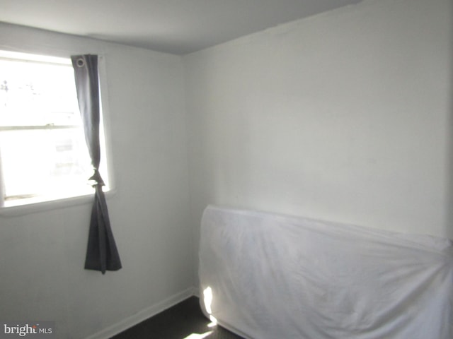 bedroom with baseboards