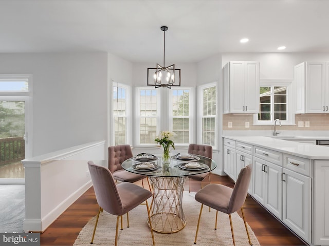9365 River Crest Rd, Manassas, VA 20110 - dining space featuring a chandelier, dark wood finished floors, plenty of natural light, recessed lighting, and baseboards