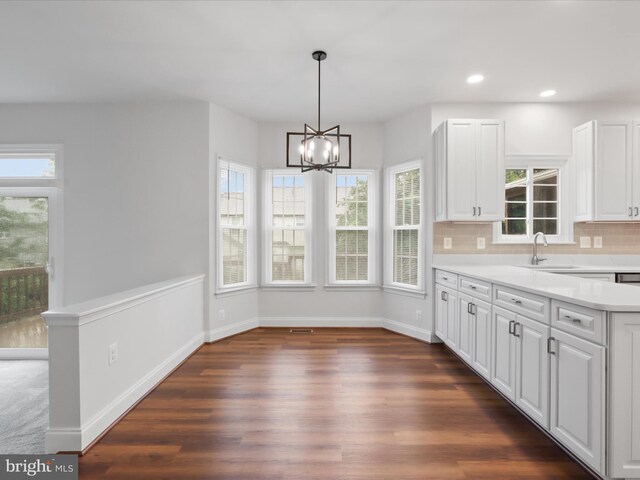 9365 River Crest Rd, Manassas, VA 20110 - kitchen featuring a chandelier, light countertops, dark wood-type flooring, plenty of natural light, and recessed lighting