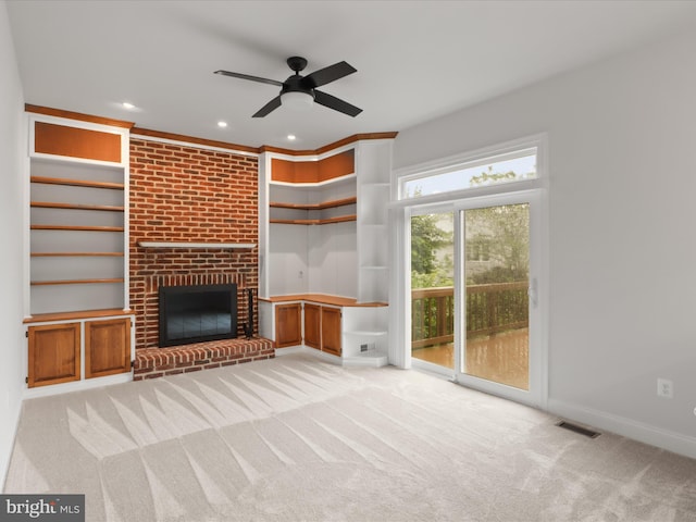 9365 River Crest Rd, Manassas, VA 20110 - unfurnished living room with light carpet, ceiling fan, built in features, a brick fireplace, and recessed lighting