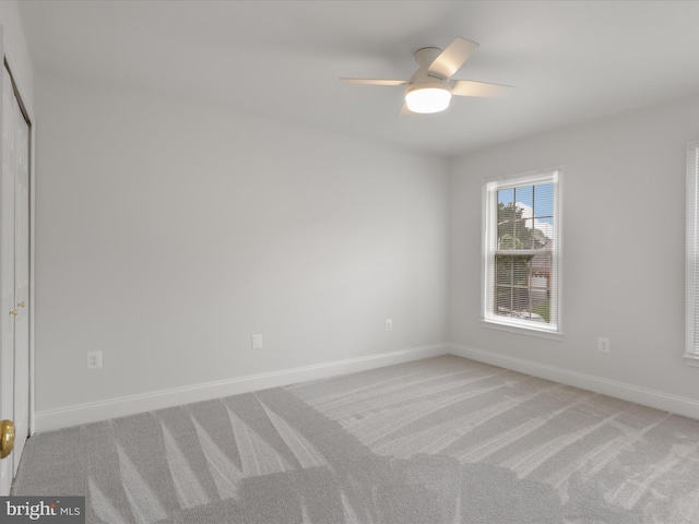 9365 River Crest Rd, Manassas, VA 20110 - spare room with light colored carpet, baseboards, and ceiling fan