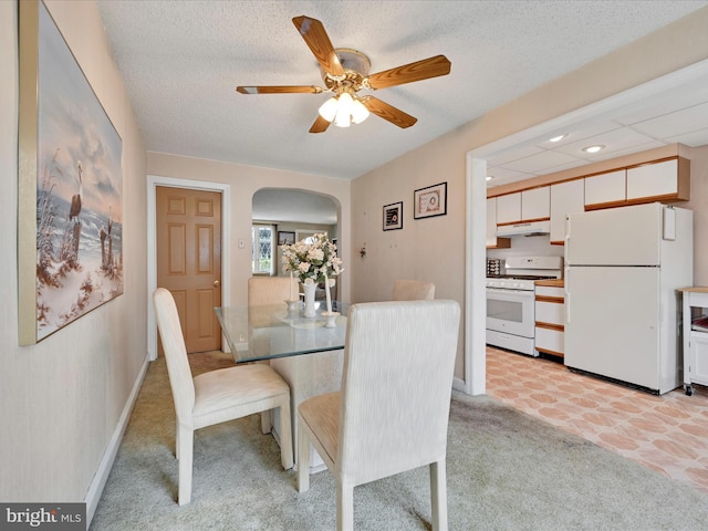 146 Academy Rd, Clifton Heights, PA 19018 - dining space featuring arched walkways, light colored carpet, a ceiling fan, a textured ceiling, and recessed lighting