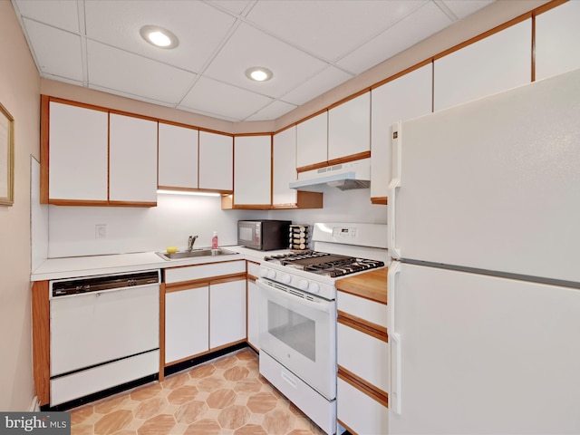 146 Academy Rd, Clifton Heights, PA 19018 - kitchen featuring white appliances, under cabinet range hood, a sink, light countertops, and white cabinets