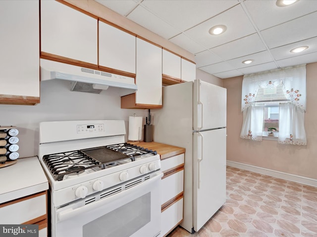 146 Academy Rd, Clifton Heights, PA 19018 - kitchen featuring white appliances, under cabinet range hood, white cabinets, light countertops, and recessed lighting