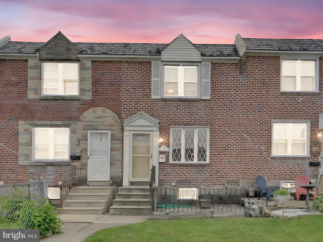 146 Academy Rd, Clifton Heights, PA 19018 - townhome / multi-family property with brick siding, entry steps, and a patio area