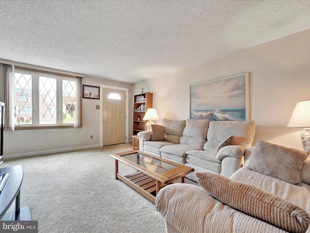 146 Academy Rd, Clifton Heights, PA 19018 - living room with carpet flooring, a textured ceiling, and baseboards