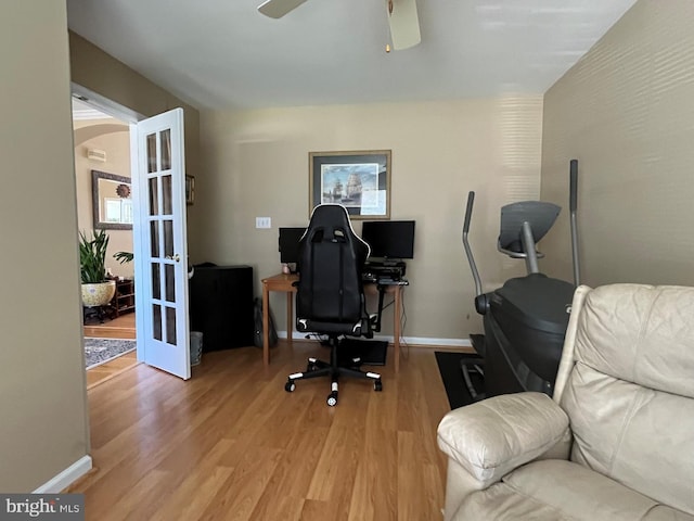 10127 Godspeed Dr, Ocean City, MD 21842 - home office with french doors, wood finished floors, baseboards, and ceiling fan