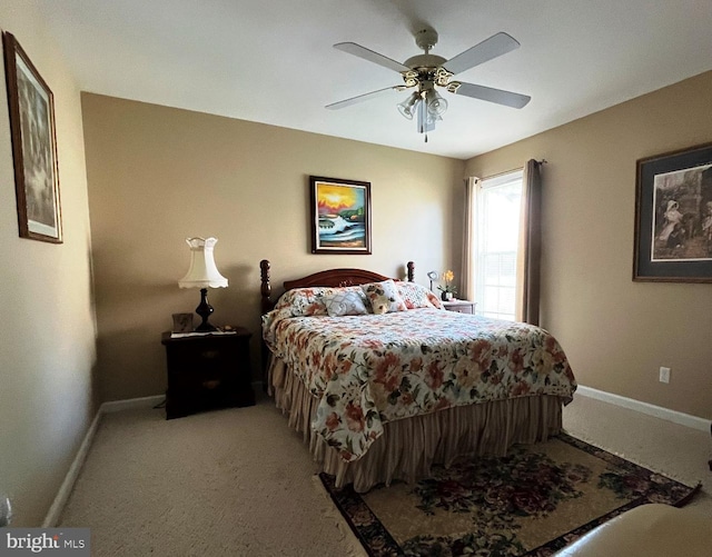 10127 Godspeed Dr, Ocean City, MD 21842 - bedroom with baseboards, ceiling fan, and light colored carpet