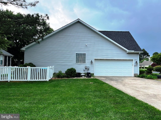 10127 Godspeed Dr, Ocean City, MD 21842 - view of property exterior featuring concrete driveway, an attached garage, and a shingled roof