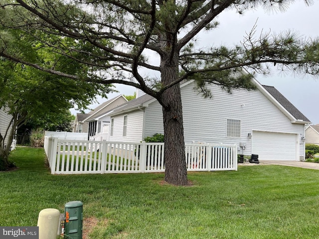 10127 Godspeed Dr, Ocean City, MD 21842 - view of side of property with concrete driveway, roof with shingles, and an attached garage