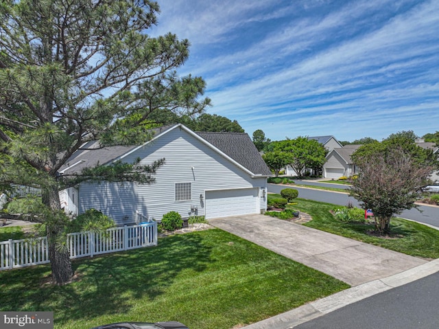 10127 Godspeed Dr, Ocean City, MD 21842 - view of side of property featuring an attached garage, concrete driveway, and roof with shingles