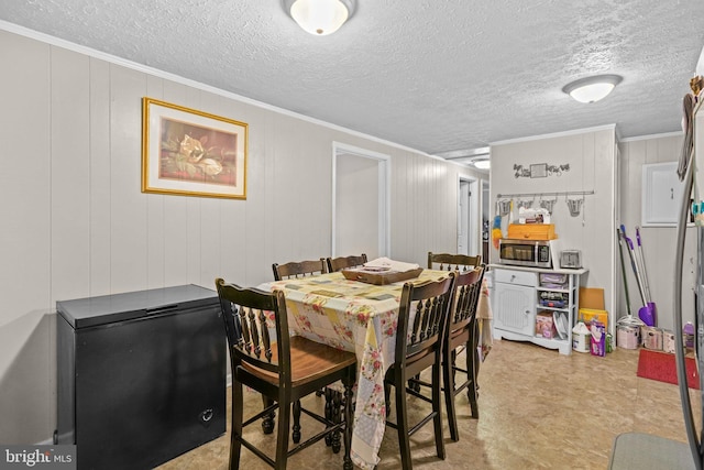 9505 Oakridge Ct, Newburg, MD 20664 - dining space with crown molding and a textured ceiling