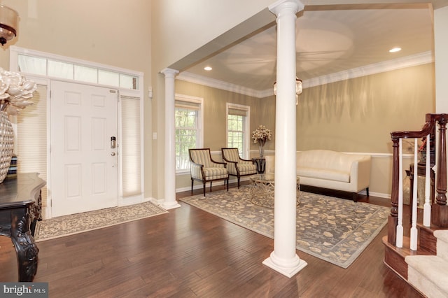 23166 Glenorchy Ct, Ashburn, VA 20148 - foyer featuring ornate columns, wood finished floors, ornamental molding, baseboards, and stairway