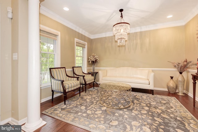 23166 Glenorchy Ct, Ashburn, VA 20148 - living area featuring ornate columns, wood finished floors, a chandelier, ornamental molding, and recessed lighting