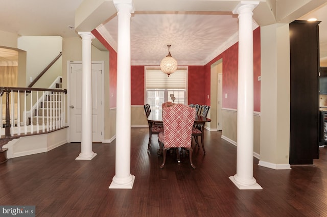 23166 Glenorchy Ct, Ashburn, VA 20148 - dining space with decorative columns, wood finished floors, baseboards, and stairway