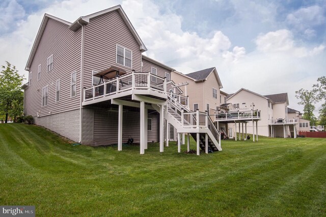 23166 Glenorchy Ct, Ashburn, VA 20148 - rear view of property featuring a wooden deck, stairs, and a yard