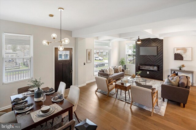 dining room with wood finished floors and baseboards