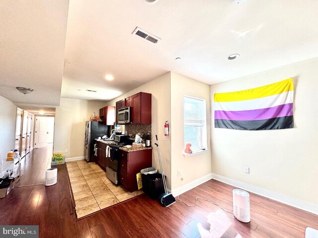 1431 N 17th St, Philadelphia, PA 19121 - kitchen with stainless steel appliances, light wood-style flooring, baseboards, and recessed lighting