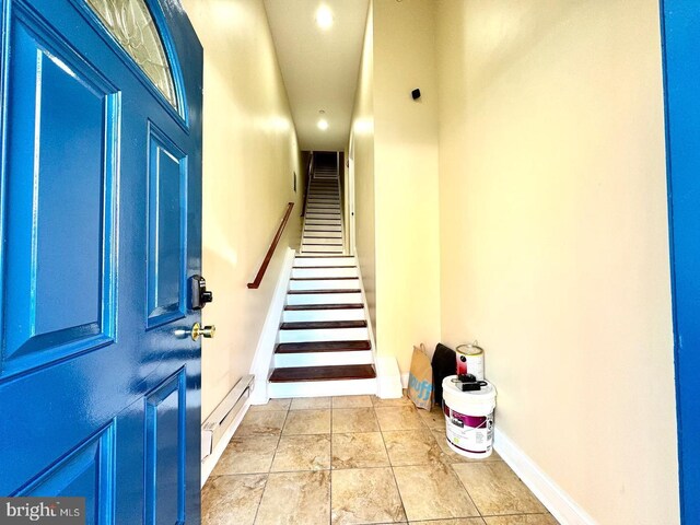 1431 N 17th St, Philadelphia, PA 19121 - entrance foyer with a baseboard heating unit, stairs, baseboards, and recessed lighting
