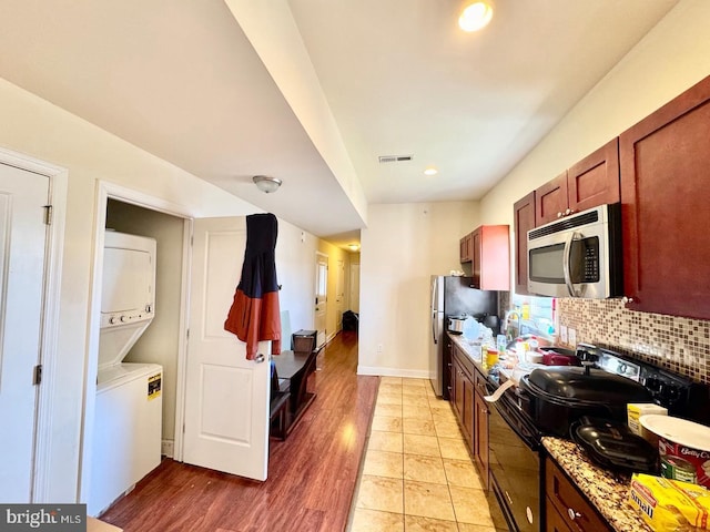 1431 N 17th St, Philadelphia, PA 19121 - kitchen with appliances with stainless steel finishes, backsplash, recessed lighting, and light wood finished floors