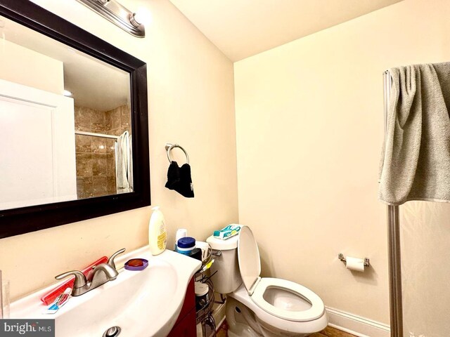 1431 N 17th St, Philadelphia, PA 19121 - bathroom with toilet, a tile shower, and vanity