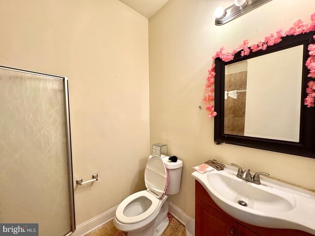 1431 N 17th St, Philadelphia, PA 19121 - bathroom featuring baseboards, toilet, and vanity