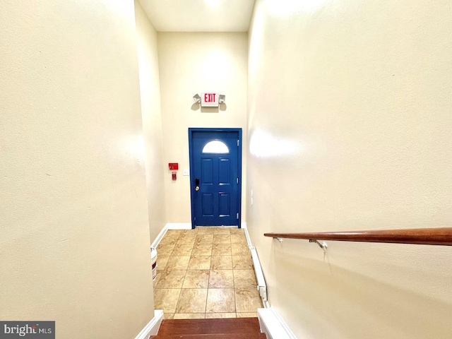 1431 N 17th St, Philadelphia, PA 19121 - doorway to outside featuring tile patterned floors and baseboards