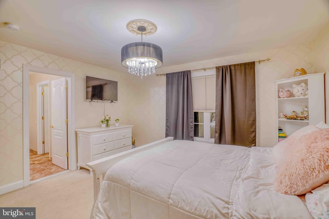 bedroom featuring a chandelier, carpet floors, wallpapered walls, and baseboards