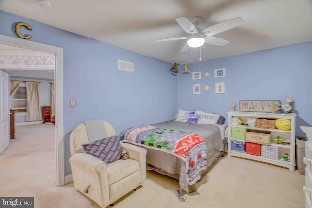 bedroom featuring carpet flooring and a ceiling fan