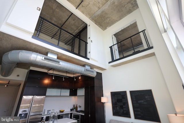 1515 15th St NW Unit 424, Washington, DC 20005 - kitchen with stainless steel appliances, a high ceiling, and modern cabinets