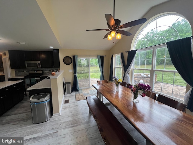 23 Cardinal Ln, Sicklerville, NJ 08081 - dining area featuring vaulted ceiling, light wood-style floors, and a ceiling fan