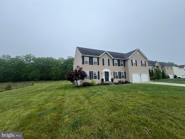 23 Cardinal Ln, Sicklerville, NJ 08081 - colonial-style house with a garage, concrete driveway, and a front lawn