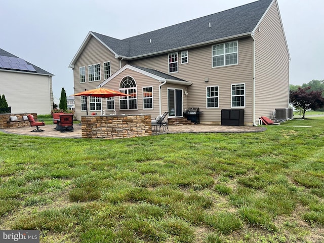 23 Cardinal Ln, Sicklerville, NJ 08081 - rear view of house featuring entry steps, a patio area, a lawn, and central AC unit