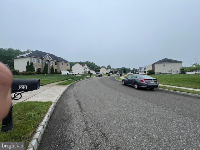 23 Cardinal Ln, Sicklerville, NJ 08081 - view of asphalt street with a residential view, sidewalks, and curbs