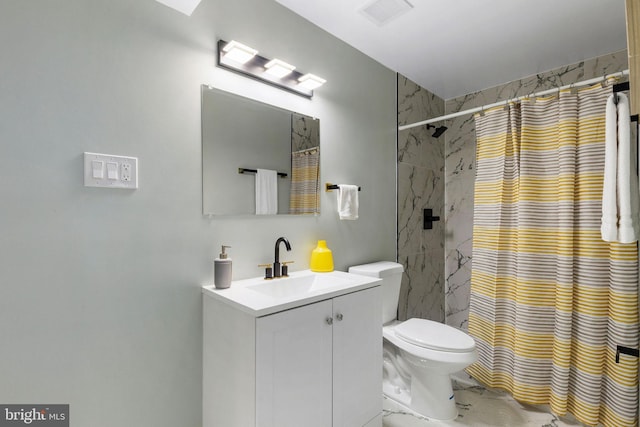 full bathroom featuring marble finish flooring, vanity, a shower with shower curtain, and toilet
