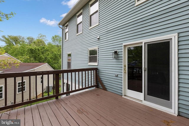 wooden terrace with central AC unit