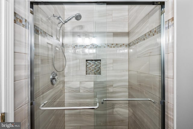 full bathroom featuring a shower stall