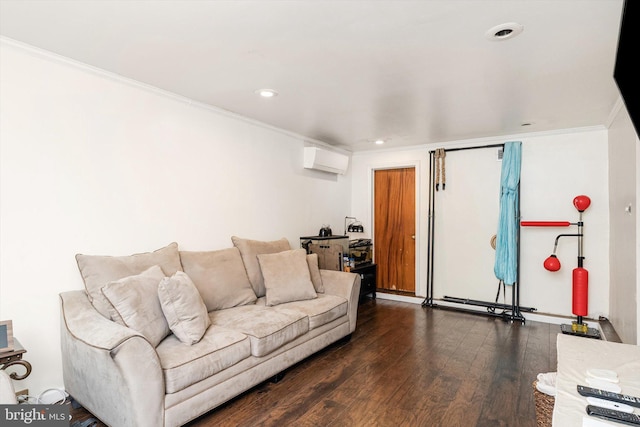 living room with a wall mounted air conditioner, crown molding, wood finished floors, and recessed lighting