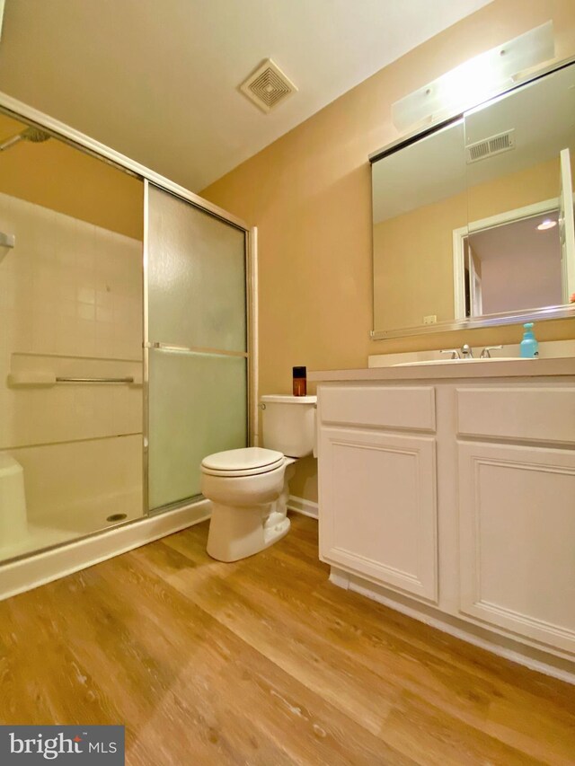 704 Dresher Woods Dr, Dresher, PA 19025 - bathroom with wood finished floors, a shower with shower door, and vanity