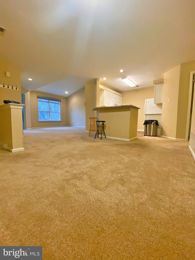 704 Dresher Woods Dr, Dresher, PA 19025 - unfurnished living room featuring light carpet, vaulted ceiling, and recessed lighting