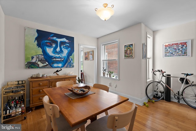 4734 Upland St, Philadelphia, PA 19143 - dining area with light wood-style flooring and baseboards
