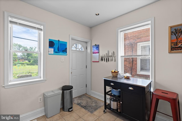 4734 Upland St, Philadelphia, PA 19143 - entrance foyer with baseboards and light tile patterned floors
