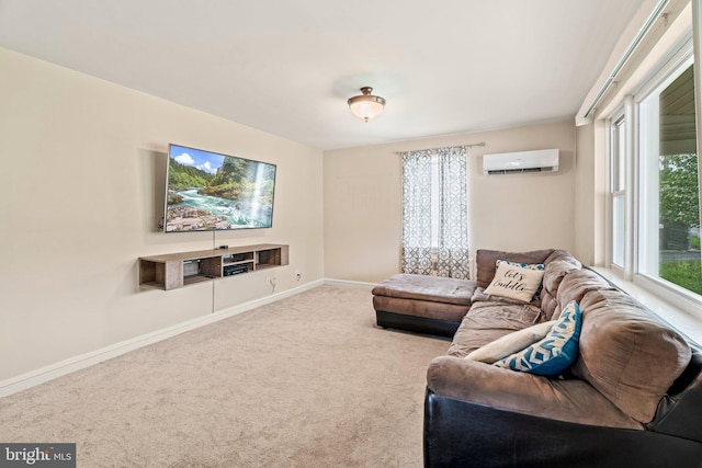 living room featuring a wall mounted air conditioner, carpet, baseboards, and healthy amount of natural light