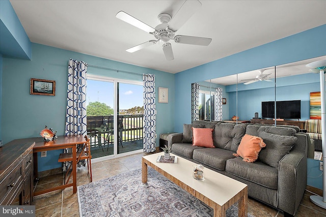 104 127th St Unit 326B, Ocean City, MD 21842 - living room with ceiling fan, plenty of natural light, and stone finish floors