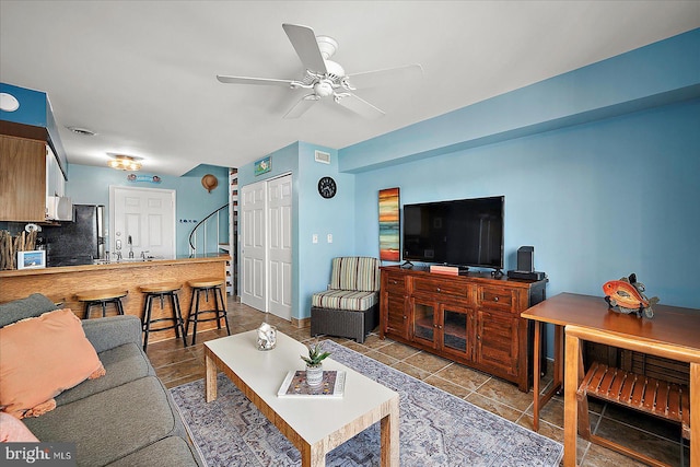 104 127th St Unit 326B, Ocean City, MD 21842 - living area with ceiling fan and tile patterned floors