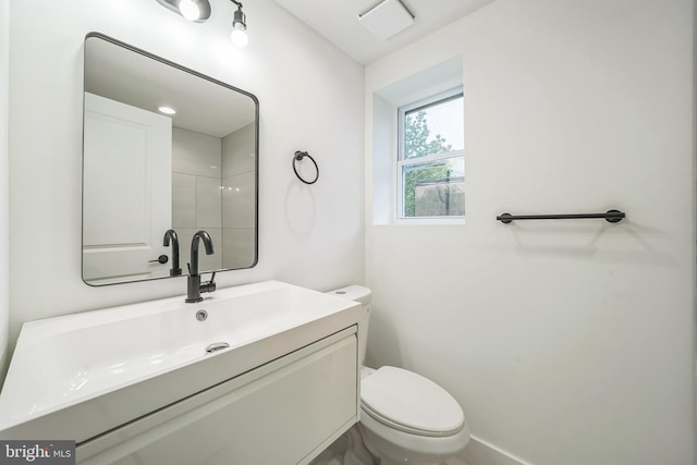 1309 S 32nd St, Philadelphia, PA 19146 - bathroom featuring toilet, vanity, and baseboards