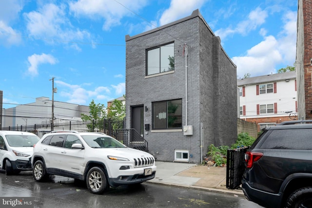 1309 S 32nd St, Philadelphia, PA 19146 - view of front of home with brick siding and fence