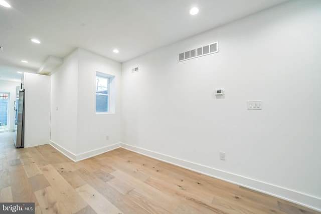 1309 S 32nd St, Philadelphia, PA 19146 - empty room featuring baseboards, light wood-style floors, and recessed lighting